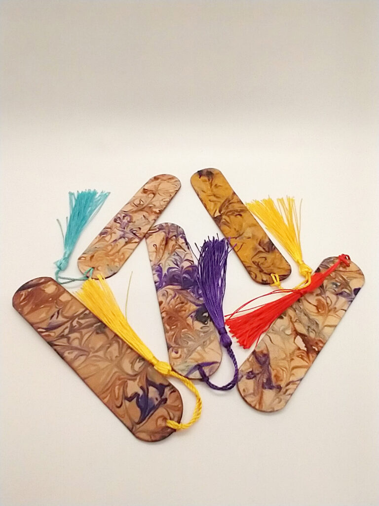 five marbled bookmarks with tassels